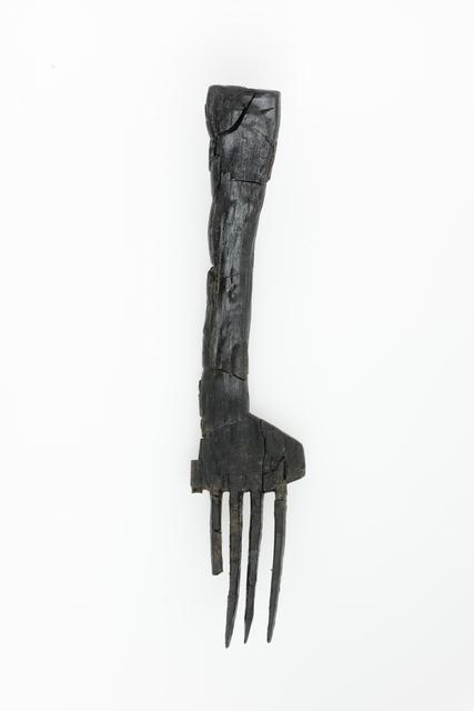 Fork-shaped wooden artifact