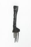 Fork-shaped wooden artifact